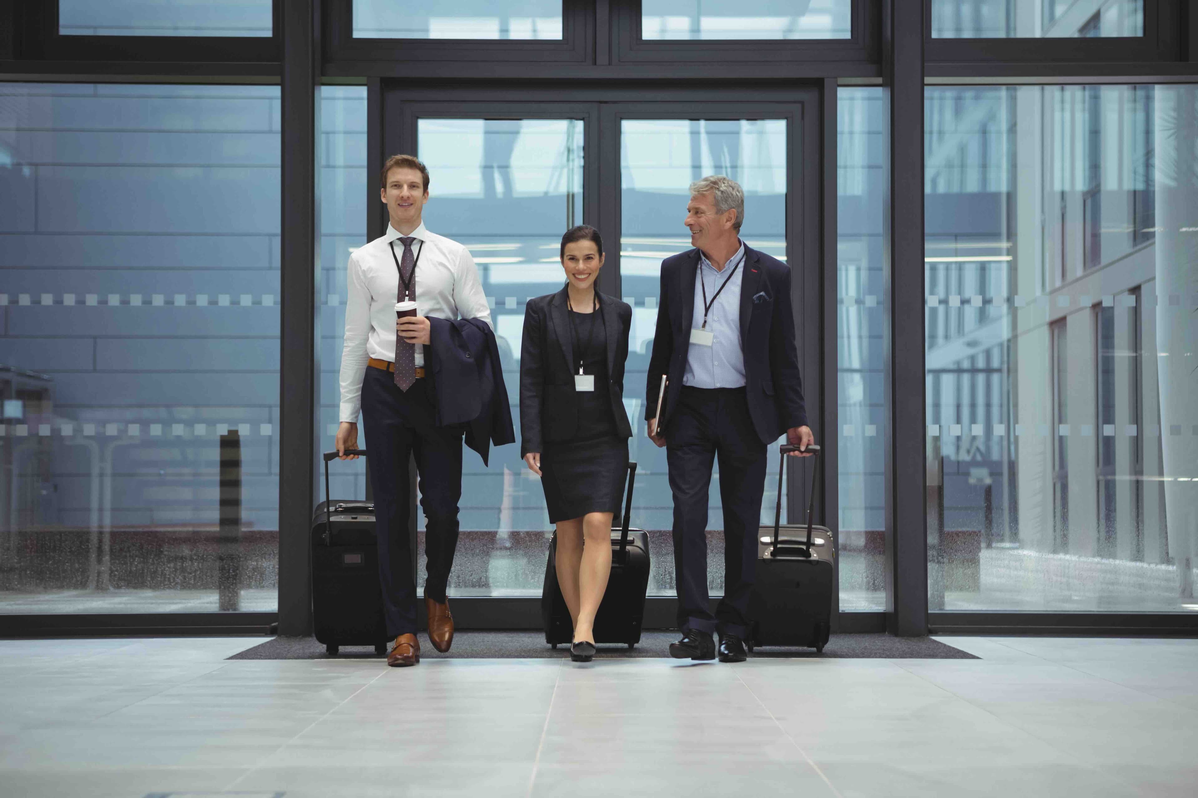 Business travelers with luggage